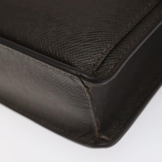 Louis Vuitton Belaia Clutch Taiga Leather