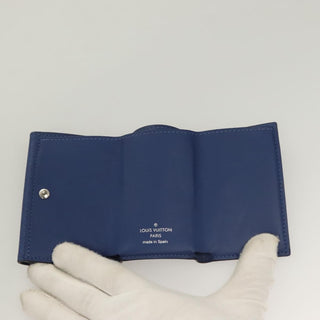 Louis Vuitton Discovery Wallet Monogram Taigarama