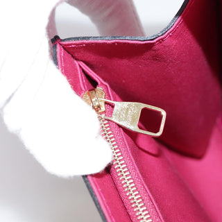 Louis Vuitton Louise Clutch Patent