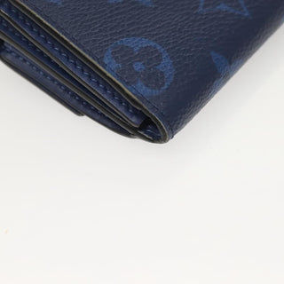 Louis Vuitton Discovery Wallet Monogram Taigarama
