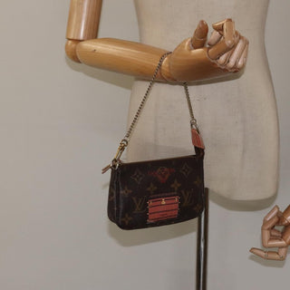 Louis Vuitton Pochette Accessoires Limited Edition Monogram Trunk
