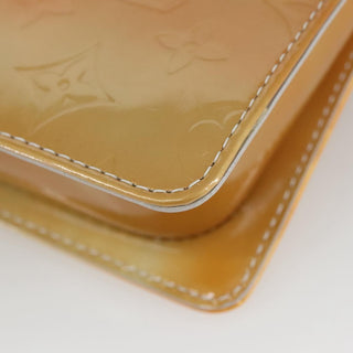 Louis Vuitton Pochette Mott Patent leather