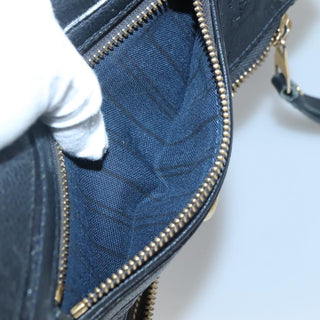 Louis Vuitton Petillante Clutch Monogram Empreinte Leather