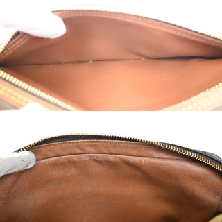 Louis Vuitton Marly Dragonne Clutch Monogram Canvas