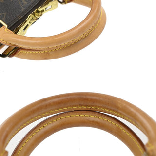 Louis Vuitton Alma Voyage Handbag Monogram Canvas