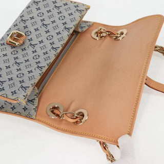 Louis Vuitton Camille Handbag Mini Lin