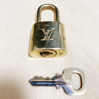 Louis Vuitton Porte Cles Cadena Bag Charm and Key Holder Metal and Enamel