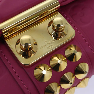 Louis Vuitton Courtney Clutch Embossed Leather