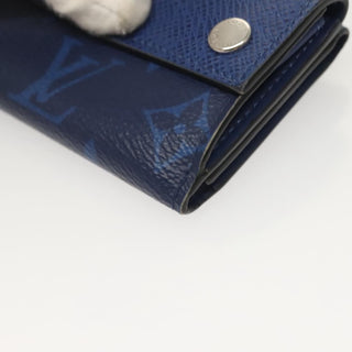 Louis Vuitton Discovery Wallet Monogram Taigarama