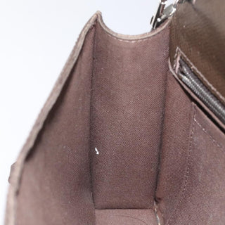 Louis Vuitton Belaia Clutch Taiga Leather