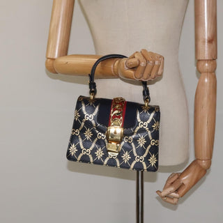 Gucci Sylvie Top Handle Bag Printed Leather