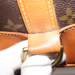 Louis Vuitton Randonnee Pochette Monogram Coated Canvas