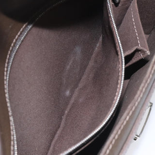 Louis Vuitton Belaia Clutch Taiga Leather