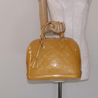 Louis Vuitton Alma Handbag Patent Leather