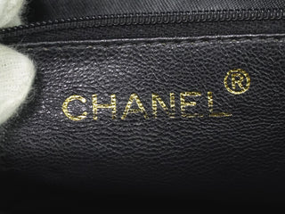 Chanel Vintage Diamond CC Tassel Clutch Quilted Lambskin