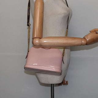 Louis Vuitton Alma Chain Handbag Vernis with Monogram Canvas