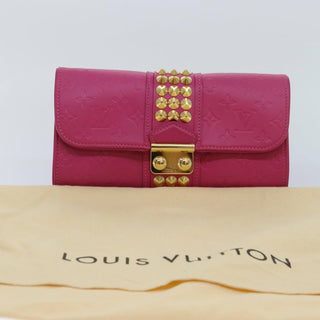 Louis Vuitton Courtney Clutch Embossed Leather