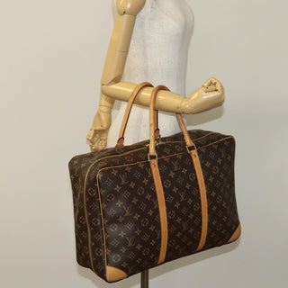 Louis Vuitton Sirius Handbag Monogram Canvas