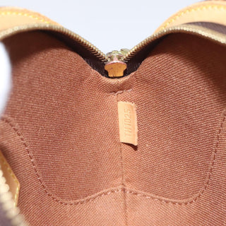 Louis Vuitton Ellipse Wristlet Clutch Monogram Canvas