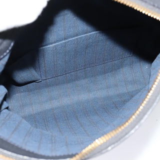 Louis Vuitton Petillante Clutch Monogram Empreinte Leather