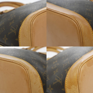 Louis Vuitton Alma Voyage Handbag Monogram Canvas